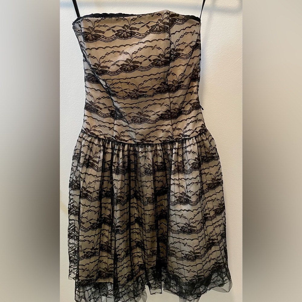 Strapless nude and black lace dress